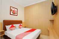 Bedroom OYO 658 Alibaba Residence