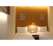 Bedroom 5 1000 Miles Hotel