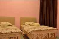 Phòng ngủ Surya Darma Homestay