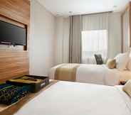 Bedroom 3 Grand Serela Yogyakarta by KAGUM Hotels