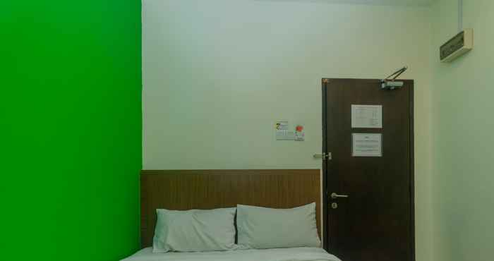 Kamar Tidur Super OYO 596 The Vintage Hotel