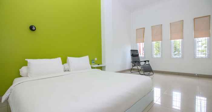 ห้องนอน Golden Snail Guest House