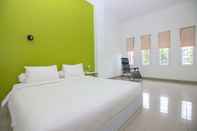 Kamar Tidur Golden Snail Guest House