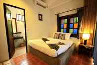 ห้องนอน Coco Lanta Resort 