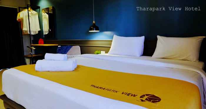 ห้องนอน Tharapark View Hotel