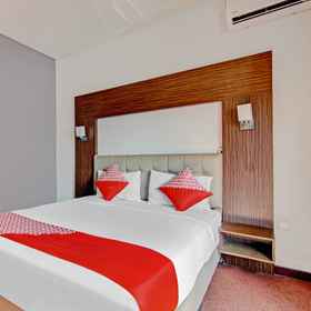 Bedroom 1 OYO 1367 Damon Butik Hotel, Pekanbaru Hotels