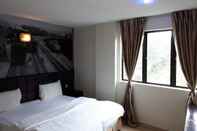 ห้องนอน De Nice Inn Kuala Lumpur