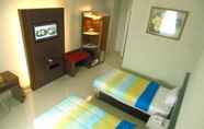 ห้องนอน 6 V Hotel Jambi