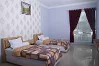 Kamar Tidur Golden Harvest Hotel