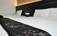 Kamar Tidur 6 Signature Hotel