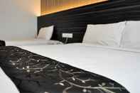 Kamar Tidur Signature Hotel