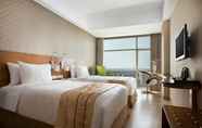 Kamar Tidur 4 Hariston Hotel & Suites