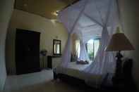 Kamar Tidur La Bella Guest House