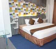 Bedroom 4 Grand Hotel Jambi