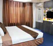 Bedroom 6 Grand Hotel Jambi