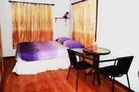 ห้องนอน Phu Lanta Life Resort