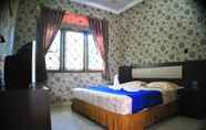 Bedroom 6 Arwana Safari Hotel Puncak