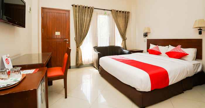 Bedroom Capital O 1430 Hotel Ratna Syariah
