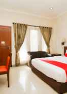 BEDROOM Capital O 1430 Hotel Ratna Syariah