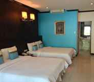 Kamar Tidur 6 Grand Thai House Resort