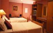 Kamar Tidur 7 Nichols Airport Hotel