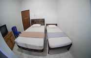 Kamar Tidur 3 Penginapan Mitra Belitung