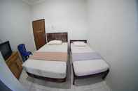 Kamar Tidur Penginapan Mitra Belitung