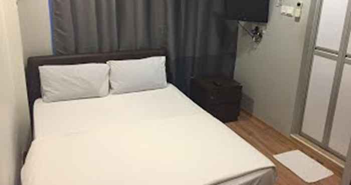 Kamar Tidur Hotel Conforto