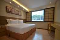 ห้องนอน Jinjiang Inn Makati