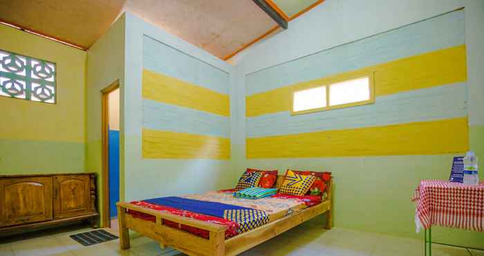 Bedroom SPOT ON 1762 Gandrung Payungan Family Inn