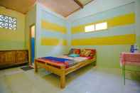 Bilik Tidur SPOT ON 1762 Gandrung Payungan Family Inn