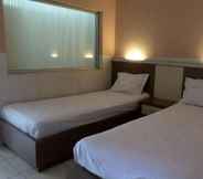 Bedroom 6 Hotel Arowana Jember 