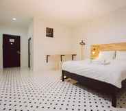 Kamar Tidur 4 Maa Lamaii Hotel