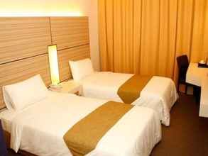 Kamar Tidur 4 Grand Medallion Hotel