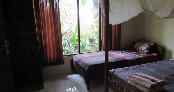 Bedroom Danu Guest House & Painter