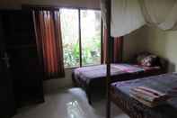 Bedroom Danu Guest House & Painter