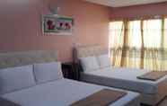 Kamar Tidur 4 Bukit Beruntung Business Hotel