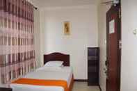 Kamar Tidur Dynasty Hotel 