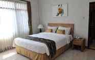 Kamar Tidur 2 Magnolia Bed & Breakfast