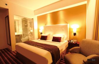 卧室 4 Royal Asnof Hotel