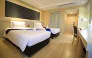 ห้องนอน 4 Vwish Hotel