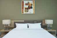 Kamar Tidur One Pacific Hotel and Serviced Apartments