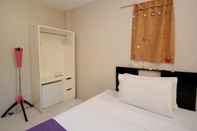 Kamar Tidur MR Holidays Hotel 