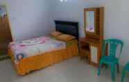 Kamar Tidur 2 Riana Homestay