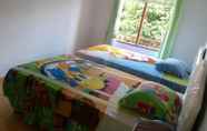 Kamar Tidur 7 Riana Homestay