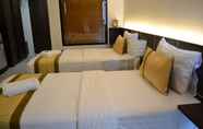 Kamar Tidur 4 The Convenience Hotel