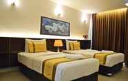 Kamar Tidur 3 The Convenience Hotel