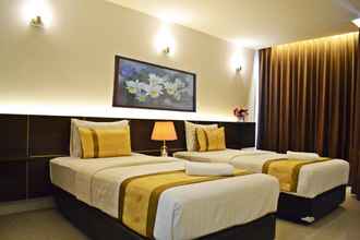 Kamar Tidur 4 The Convenience Hotel