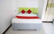 Kamar Tidur 5 OYO 210 Apple Tree Suites