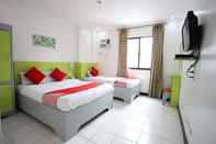 Kamar Tidur OYO 210 Apple Tree Suites